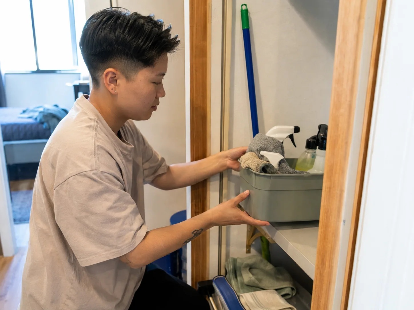 A realistic compact living room being cleaned with a few easy-to-store tools